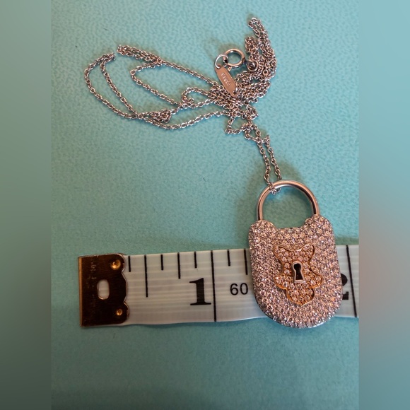Tiffany&Co. Vintage Lock Pendant, Platinum and 18 K with round brilliant . - Picture 9 of 10
